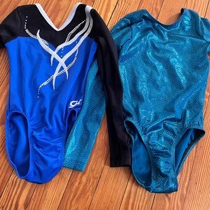 Two long sleeve leos. Child medium